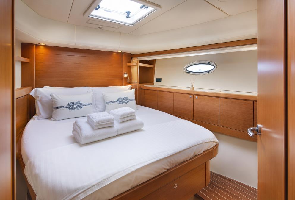 Folded linen and towels in a yacht cabin