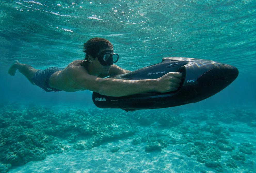 Underwater sea scooter in clear water